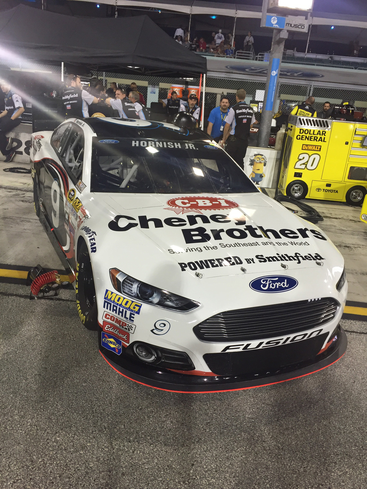 The #9 Cheney Brothers Ford Fusion and crew awaiting qualifying at Homestead-Miami Speedway on November 20th, 2015 (Photo credit: Roy Gangdal of BK Racing)