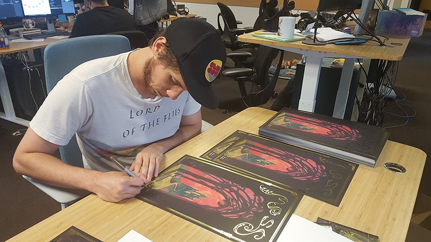 Signing session at Polyarc. The prints turned out really great. 11x17 matte with a gold ink border. 