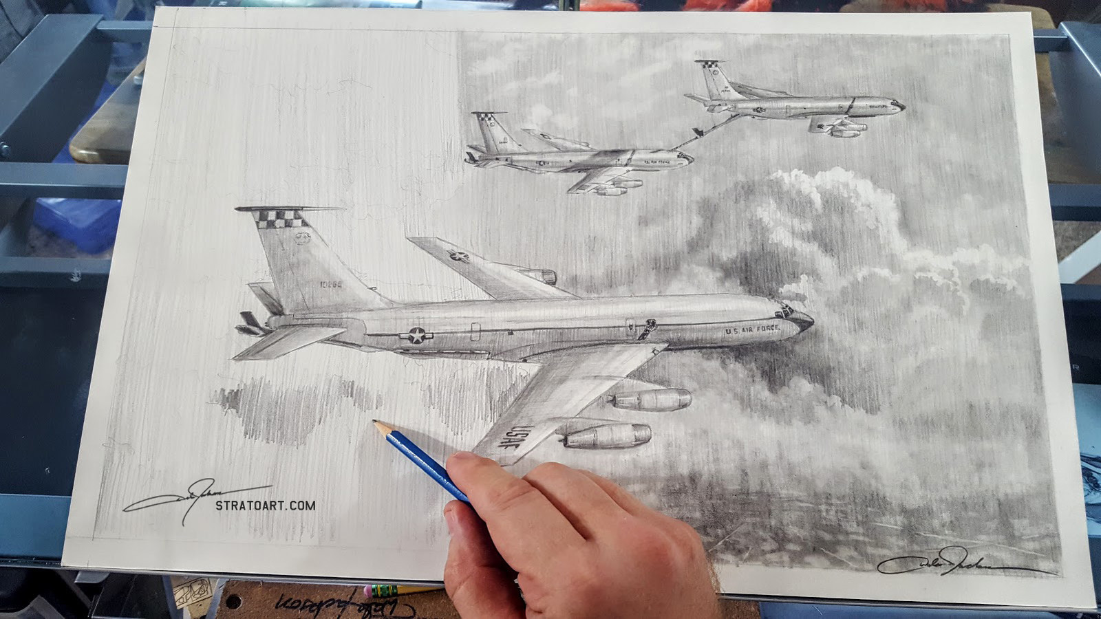 Having drawn the tankers, I still work on the background. I usually go from left to right, so as not to smudge with my hand, but I started off in the middle and just worked outward as I pleased.