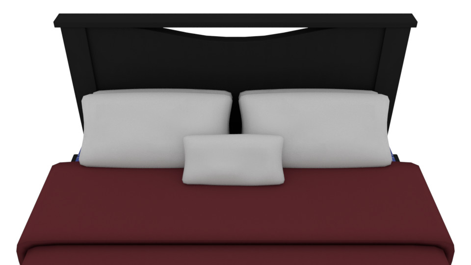 Close up of the pillows of the bed.