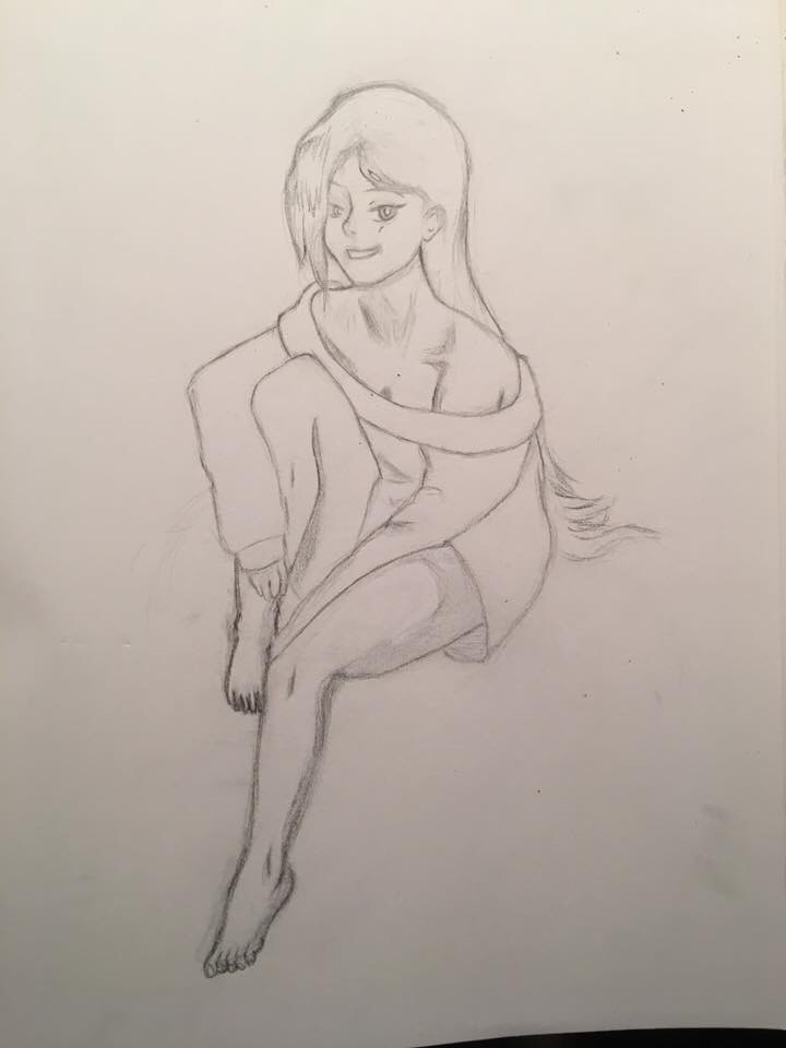girl sitting down drawing