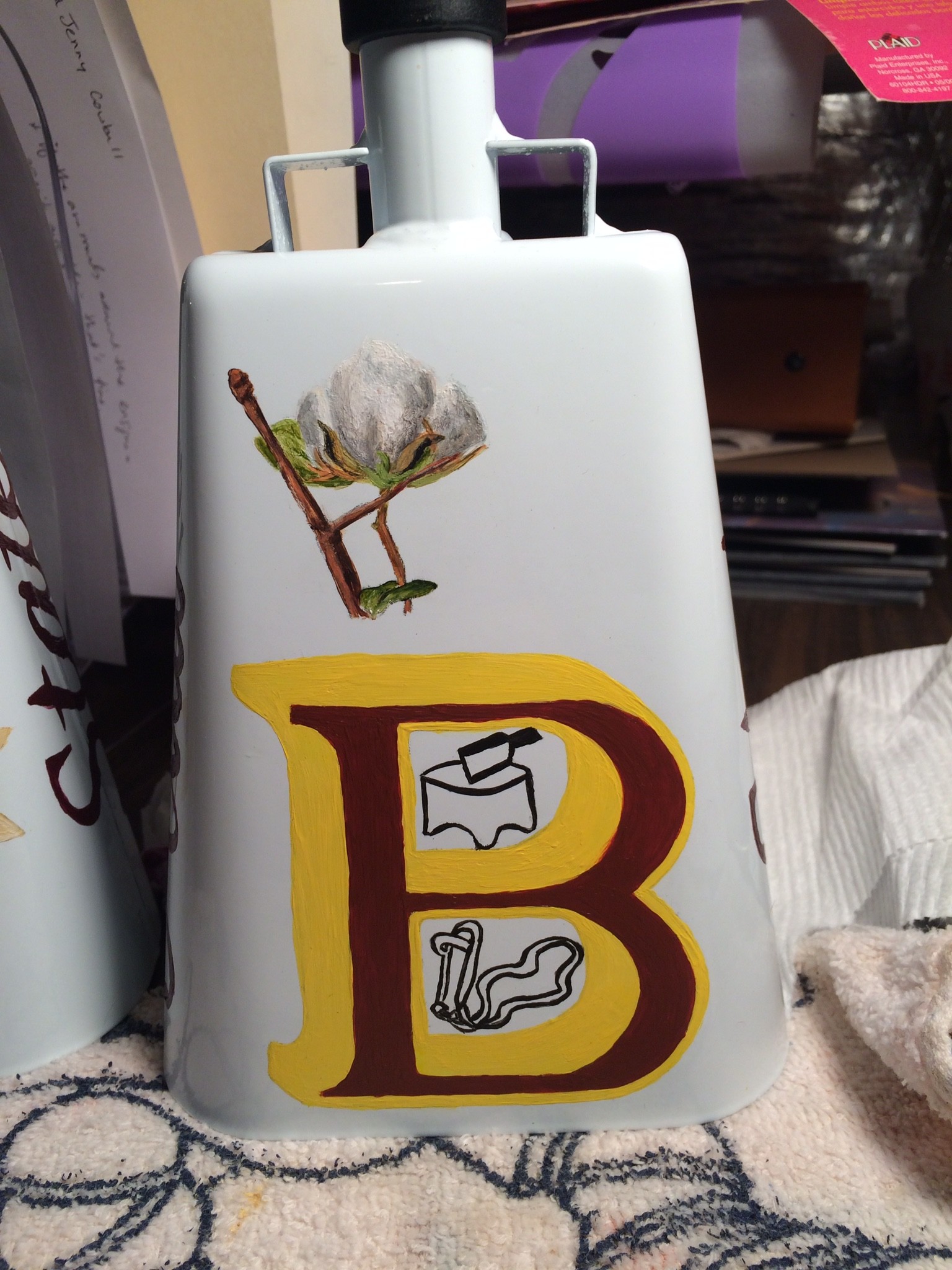 Lauren Reis MSU Cowbells