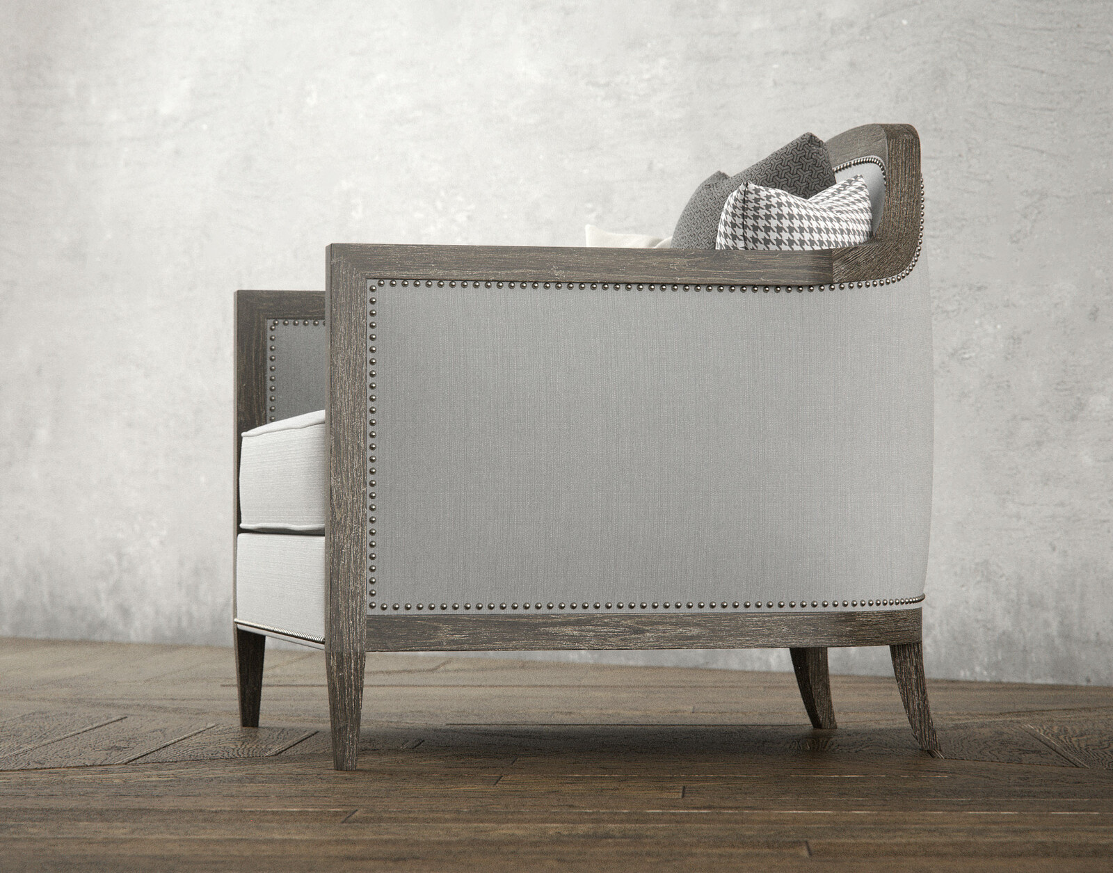 Side rendering of the Mollis upholstered arm chair.