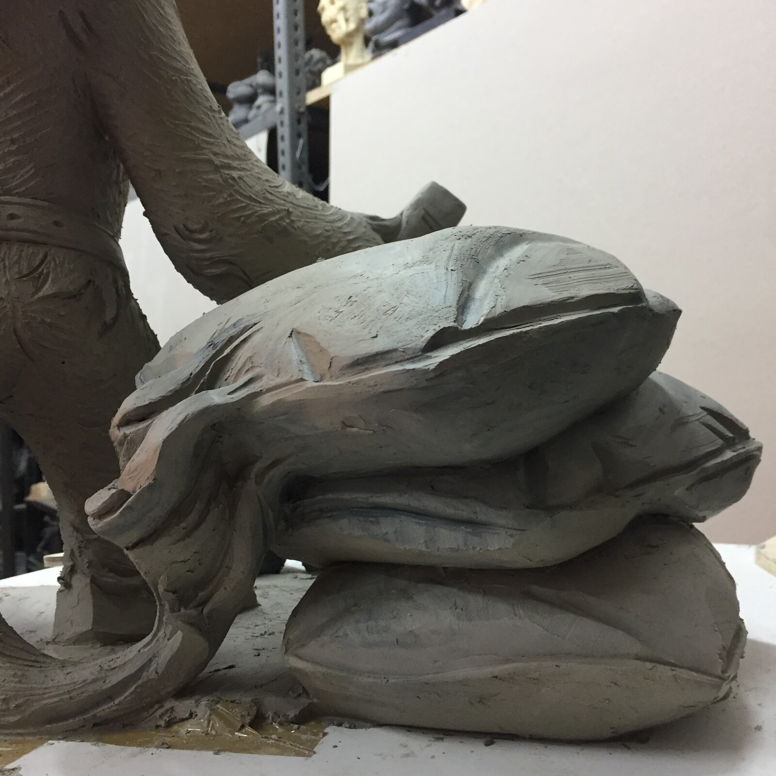 Hewelion wster clay sculpture. It is 53 cm tall. 