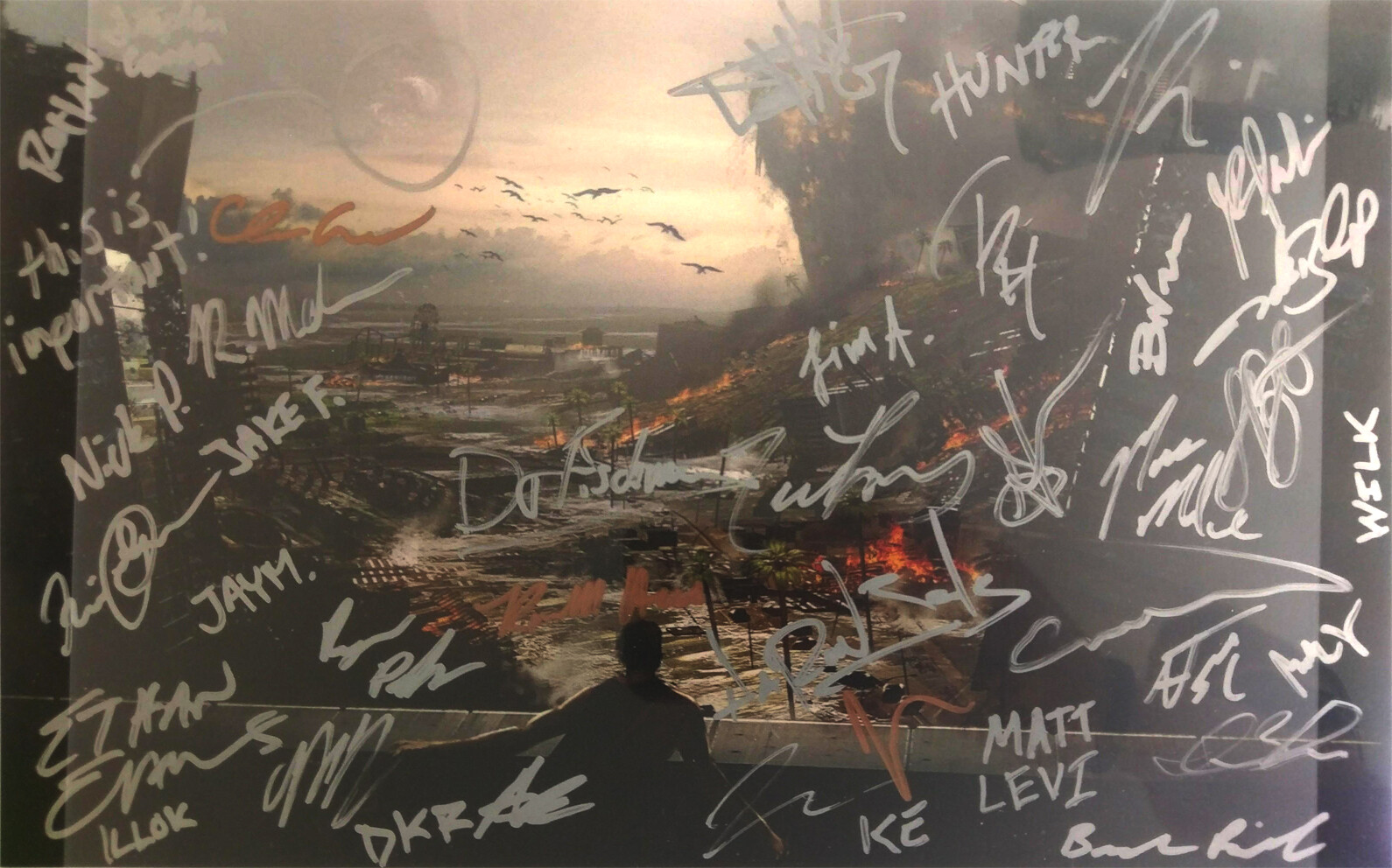 This is a fan's photo that won a contest for Lawbreakers and recieved a print of my concept, signed by several employees at Boss Key Productions! Pretty cool!