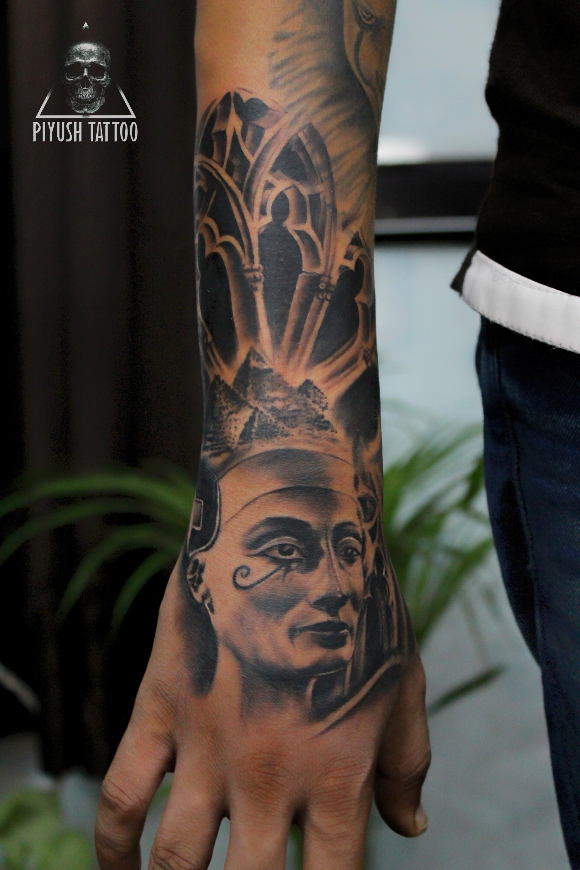 Colored Egyptian Queen Tattoo On Bicep by Fabian de Gaillande