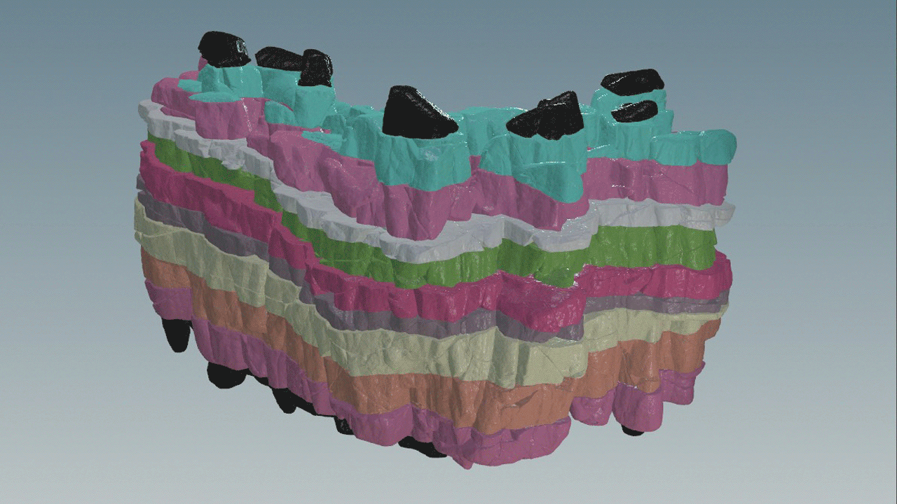 The tool is also capable of automatically  creating the low poly version of the rock structure. Colours are applied to each layer and transferred to the low poly  and used to break up each into it's own UDIM tile for large rock structures. 