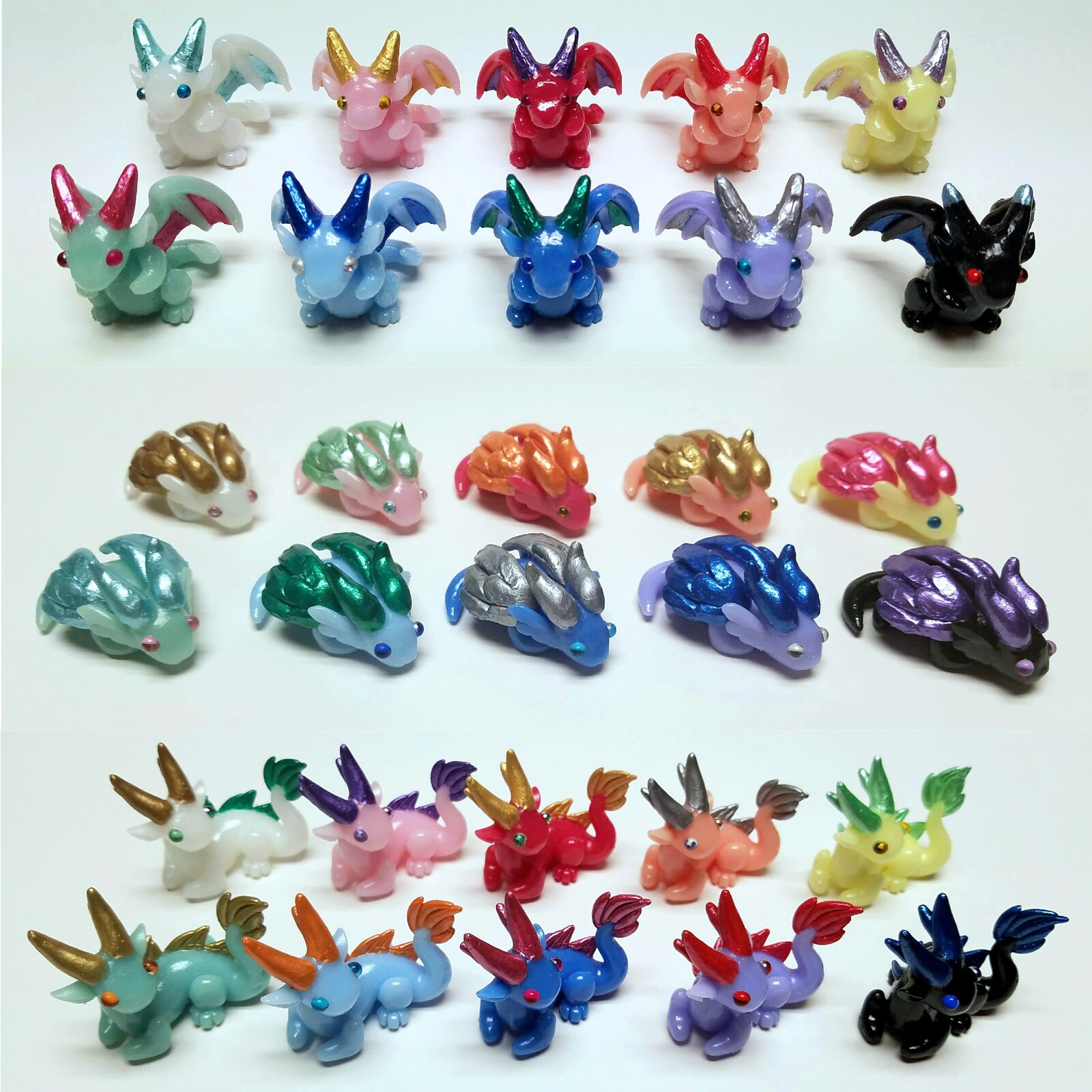 Small Dwagon figures roughly 1.5-2 inches. Come in a variety of colors and styles. Resin cast with hand painted details. 