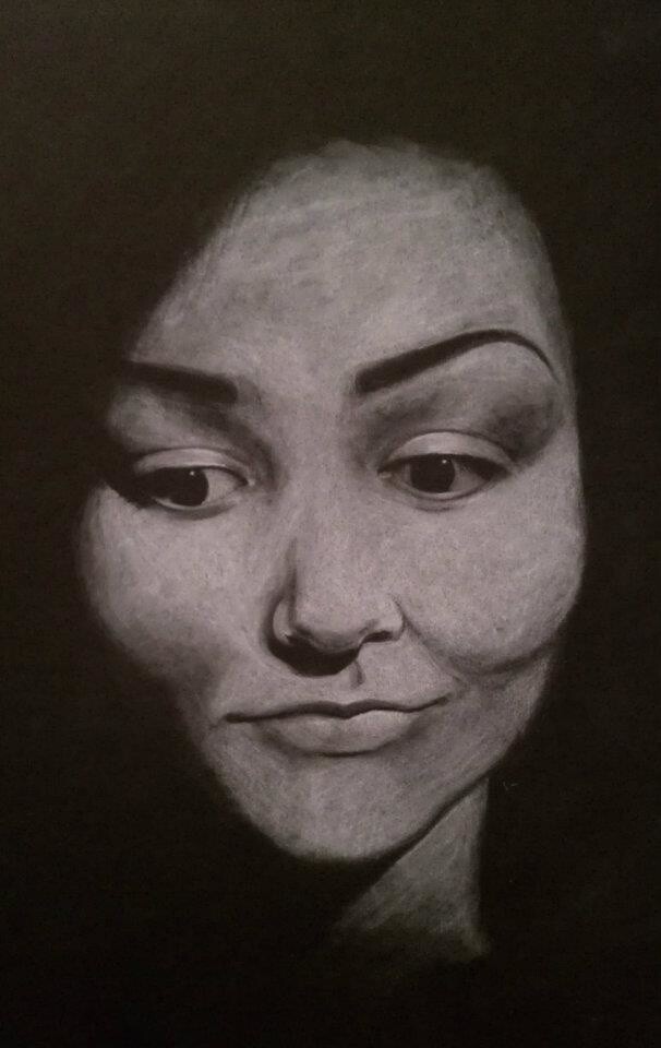 Self-portrait on black paper with white pencil