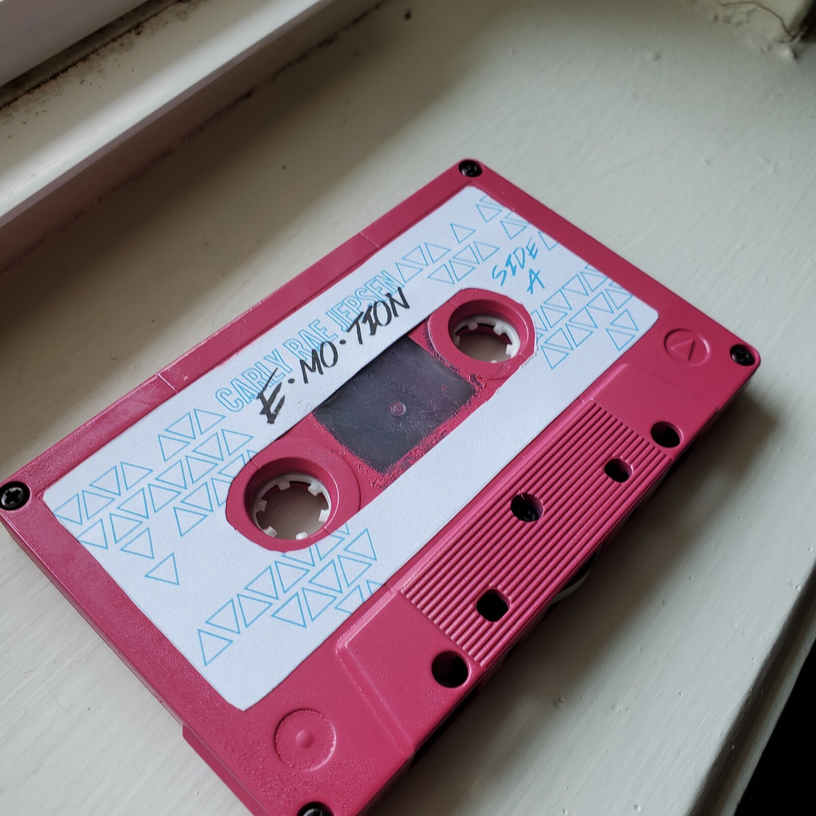 Cassette outside of case with label.
