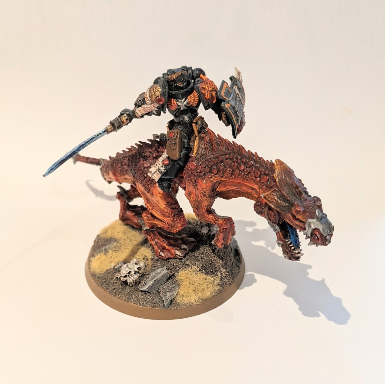 my actual miniature.  I use the Space Wolf Codex: Wolf Lord on Thunderwolf to play him. 