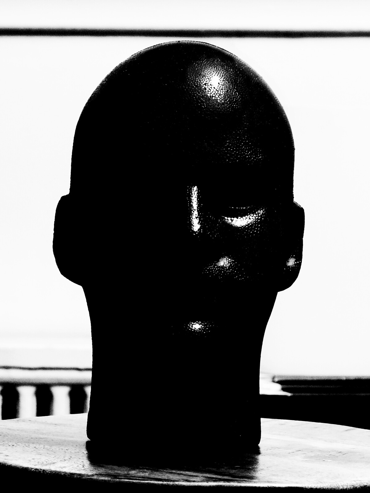 Photograph of a the manikin head demonstrating the  placement and properties of  of the highlight. Created by Vince Mancuso