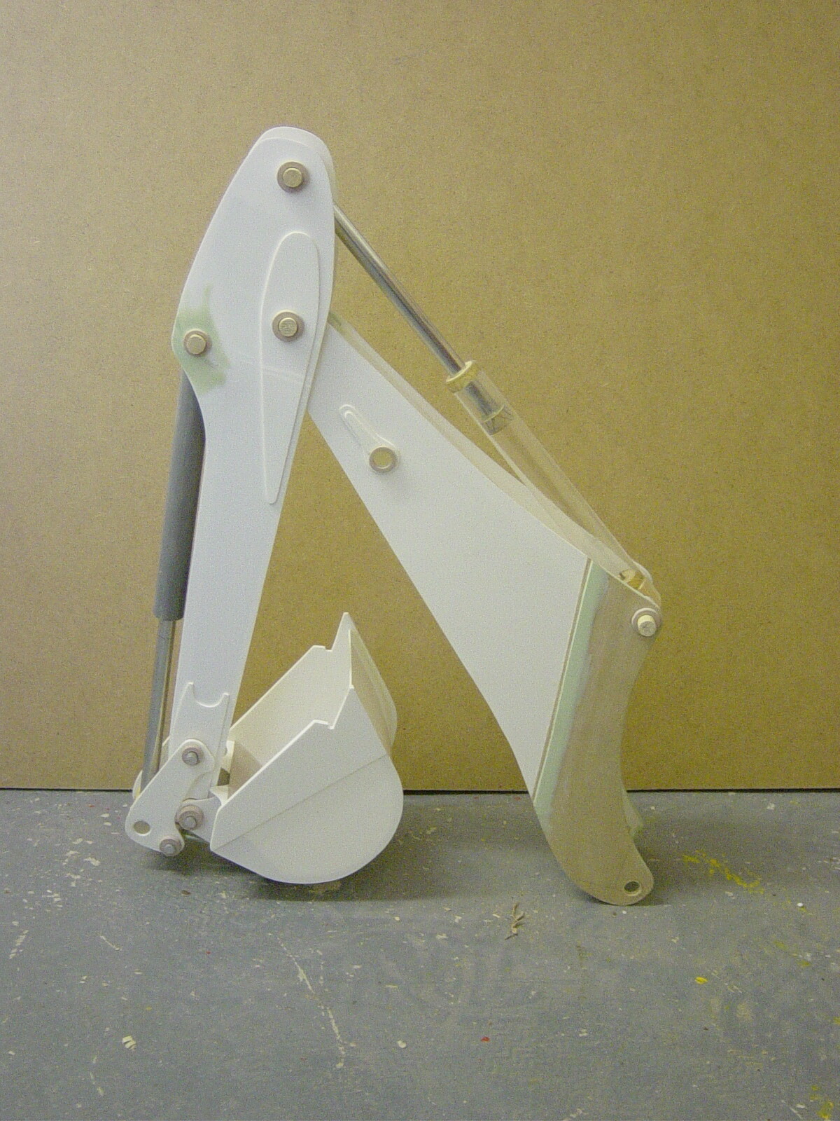 The rear arm feature was put together using styrene, mdf, kemi wood and filler.