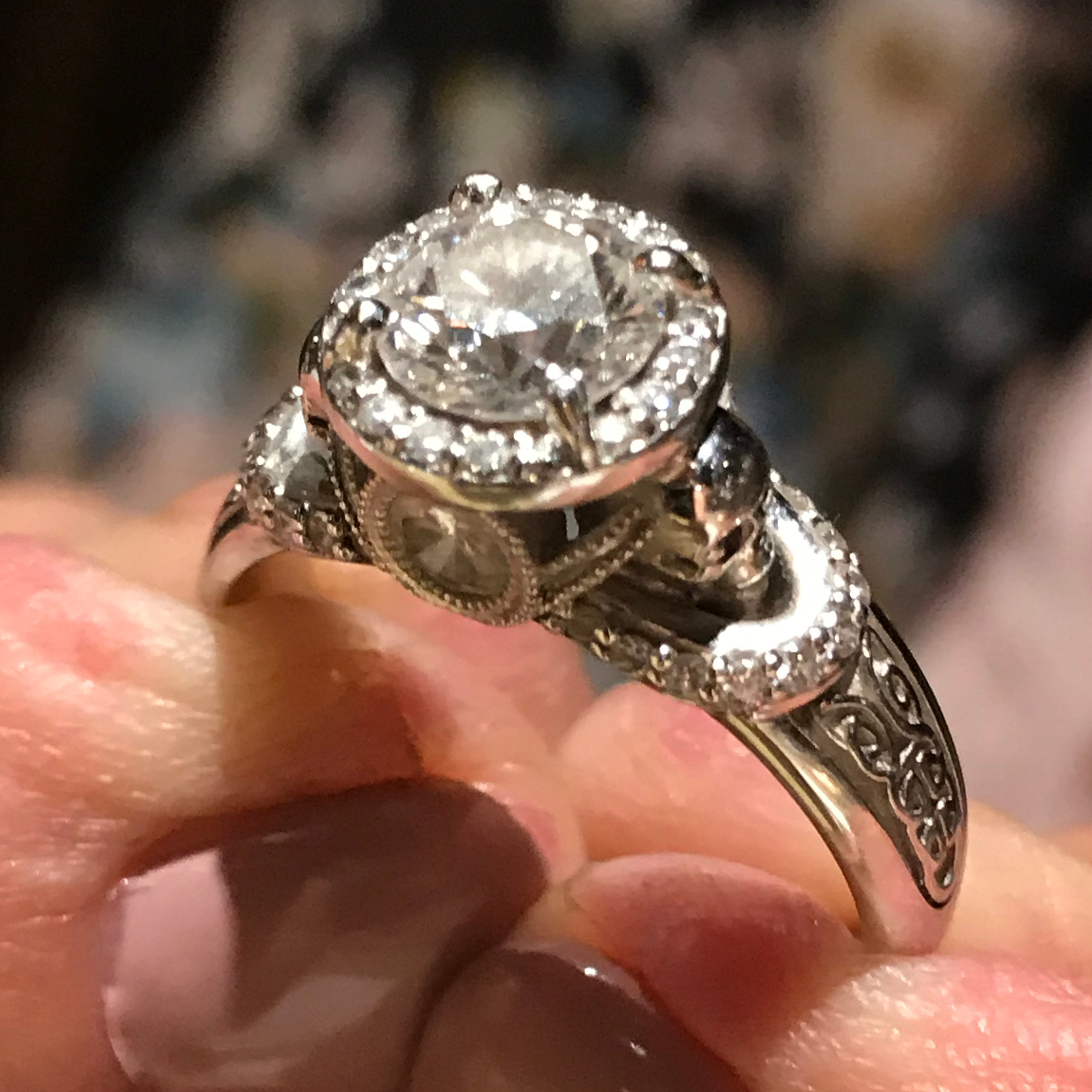 Final design as delivered to client. White gold, diamonds, and black diamonds in the skull eye sockets.