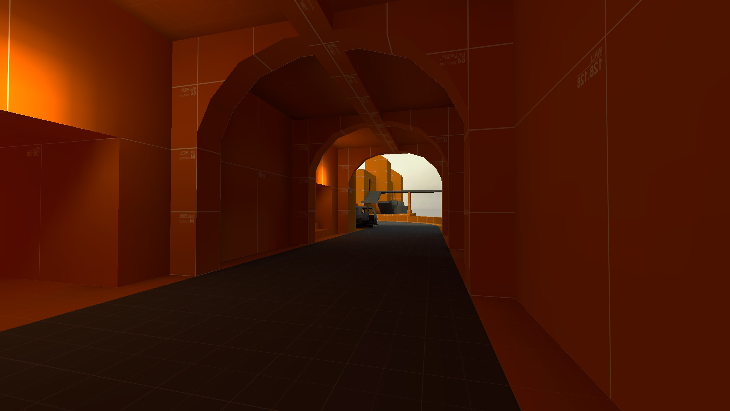 A blockout screenshot of the entrance tunnel headed towards the central exterior section.