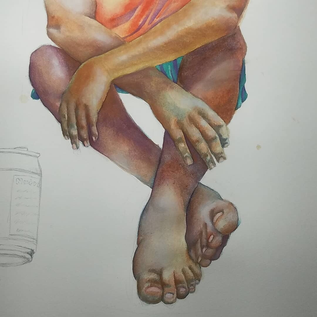 Painting the skin and clothing with watercolor.