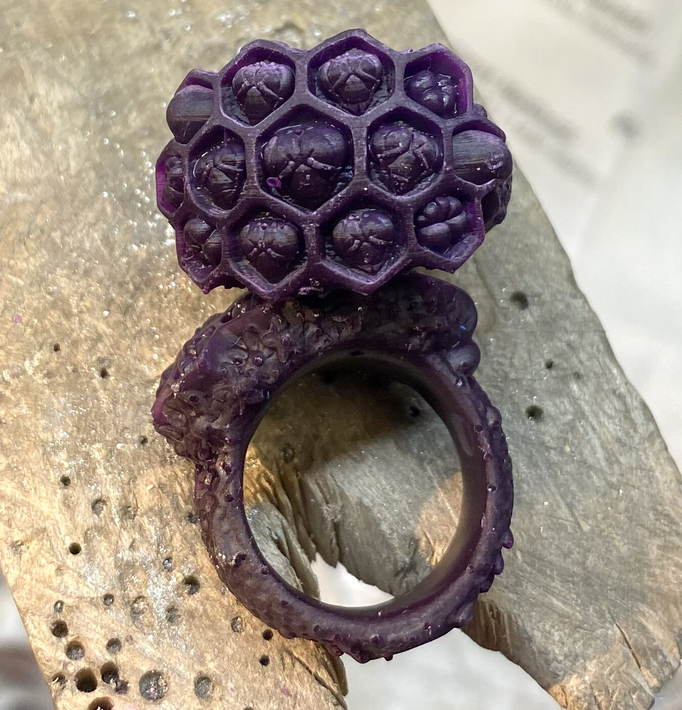 Test print of the honeycomb ring in purple resin
