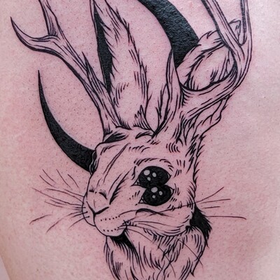 jackalope arm tattoo