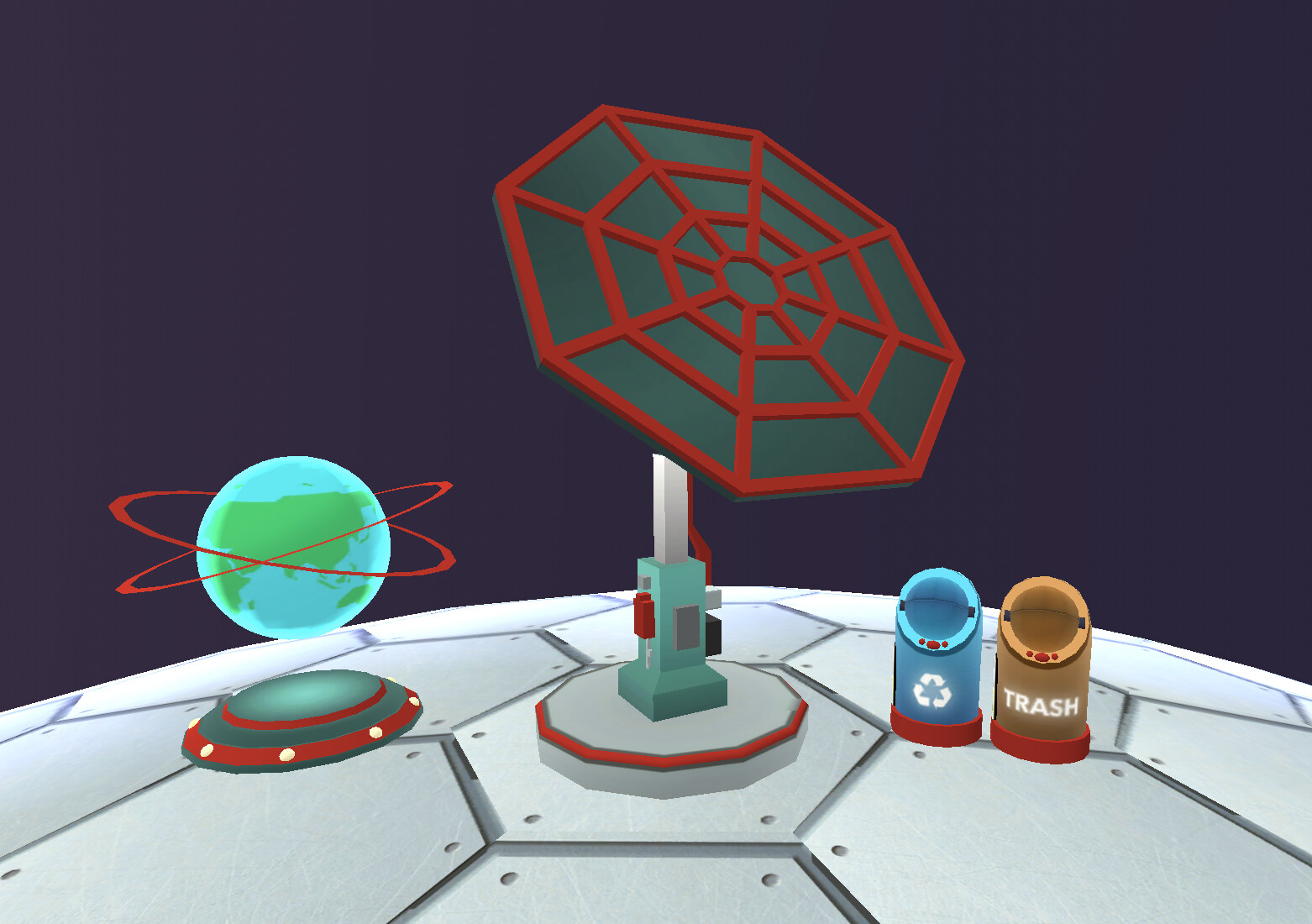 Props for MathTango Starbase from right to left: Earth Hologram, Solar Panel, and Recycling Bins
Starbase has a special feature of allowing the player to choose accent colors for props, so each area that is red on a prop can be customized by the player.
