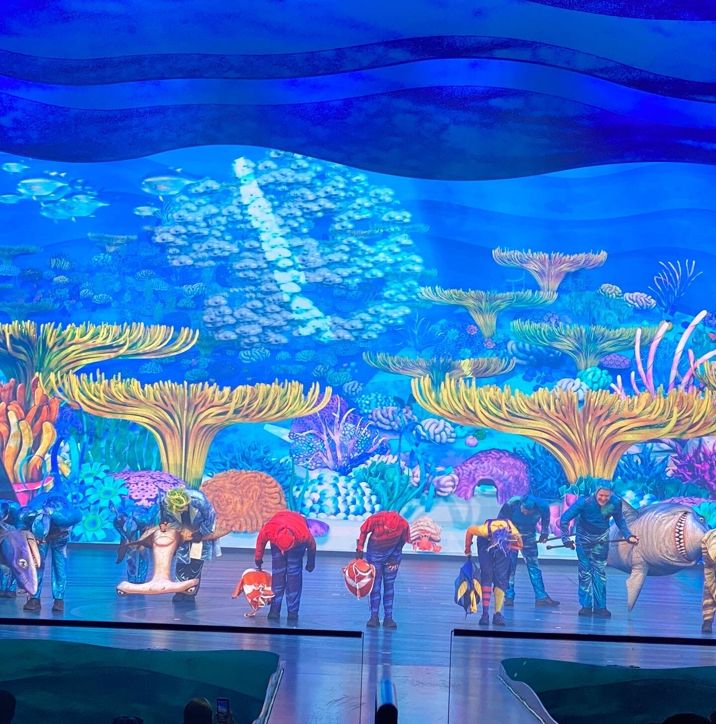Big Blue in show with performers. Layout by Tony Reser. If you look closely you can see Hermie the Hermit crab bows the same time as the performers!