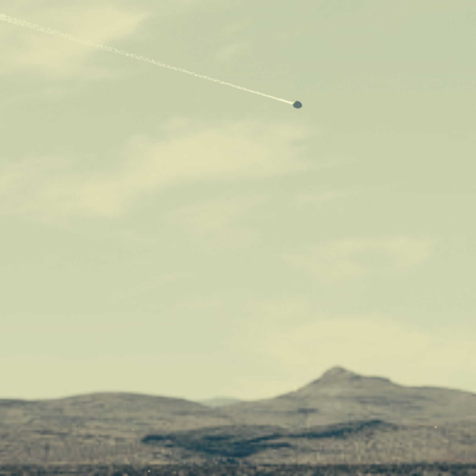 The Convair Manned Anti-Satellite System reenters over the Mojave Desert.