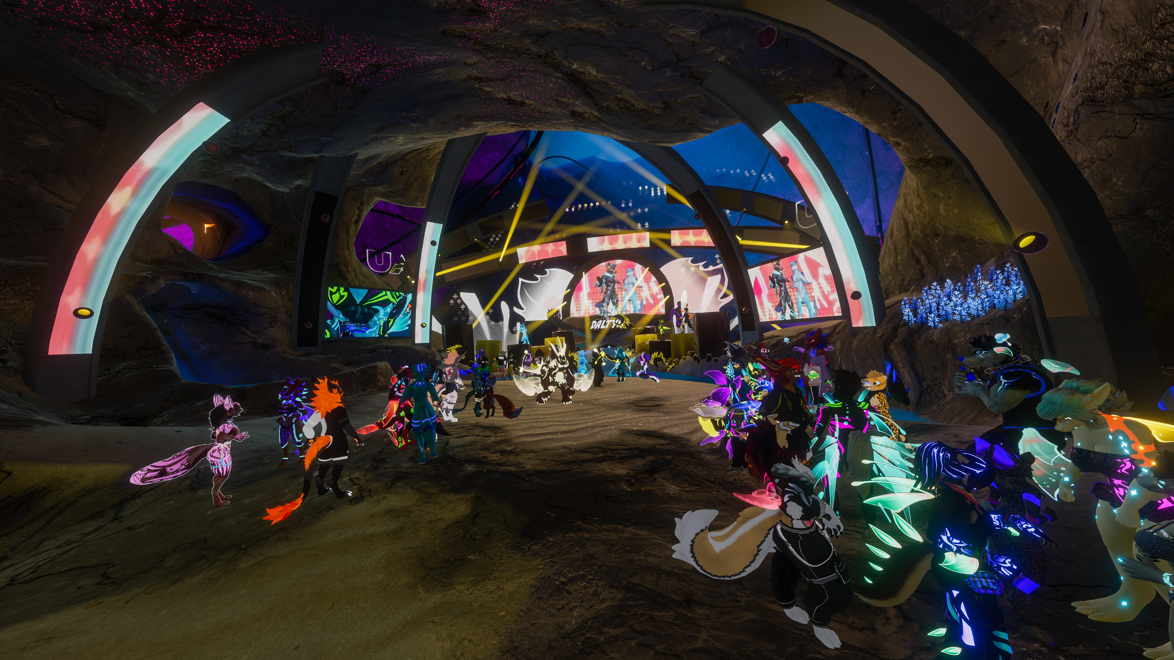 Furality AQUA's Club F.Y.N.N. in VRChat. The visuals were split into smaller displays and mapped onto multiple walls.