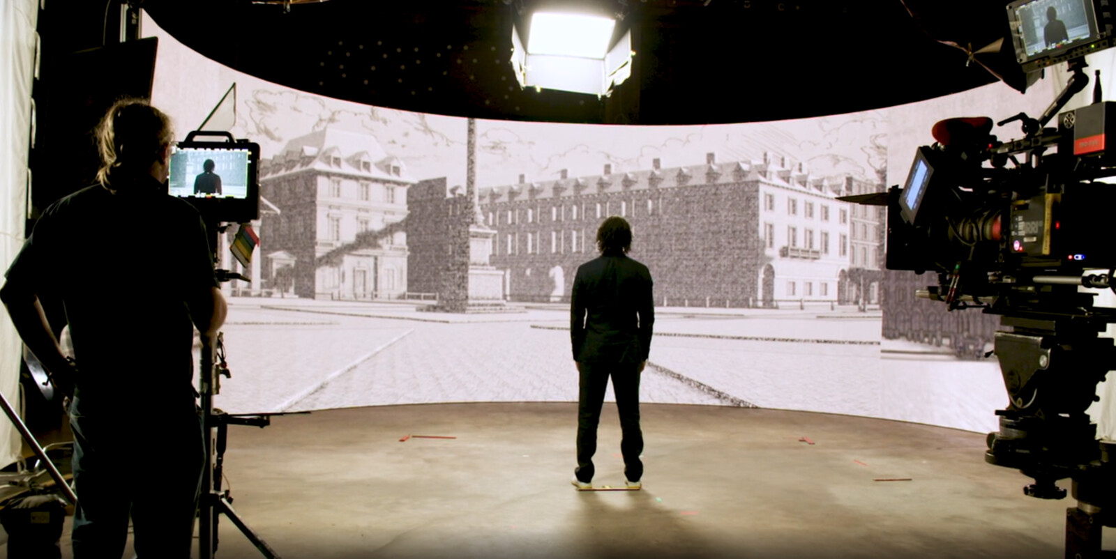 A shot of the set with the cross hatched env on the wall