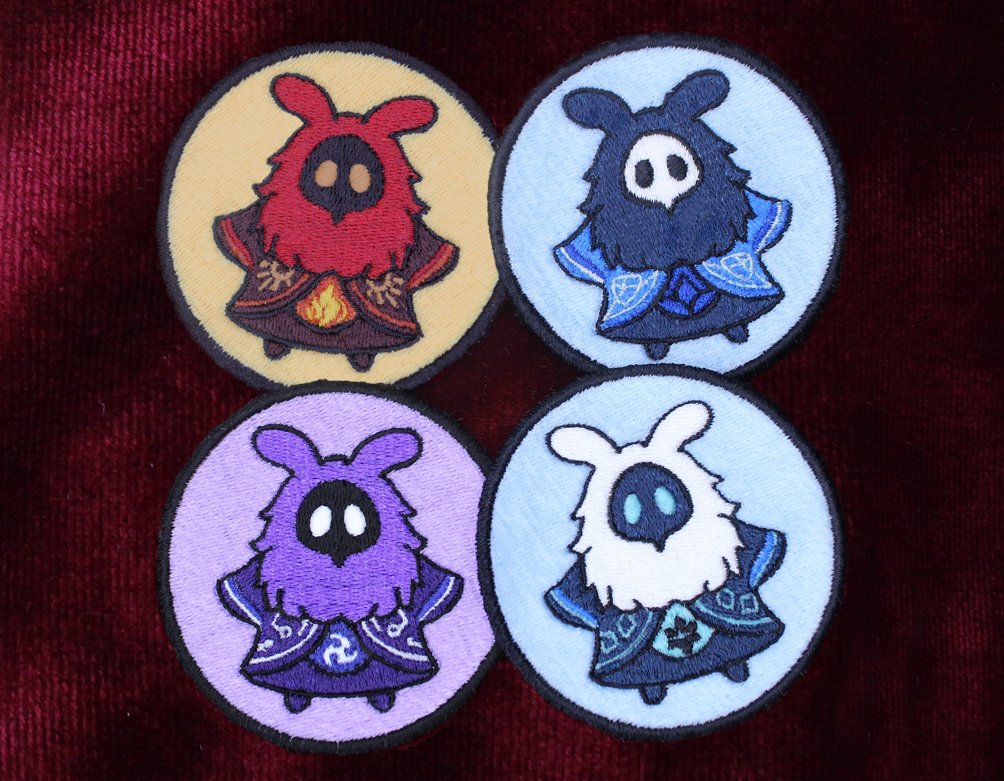 Close up of all four Abyss Mage patch designs 