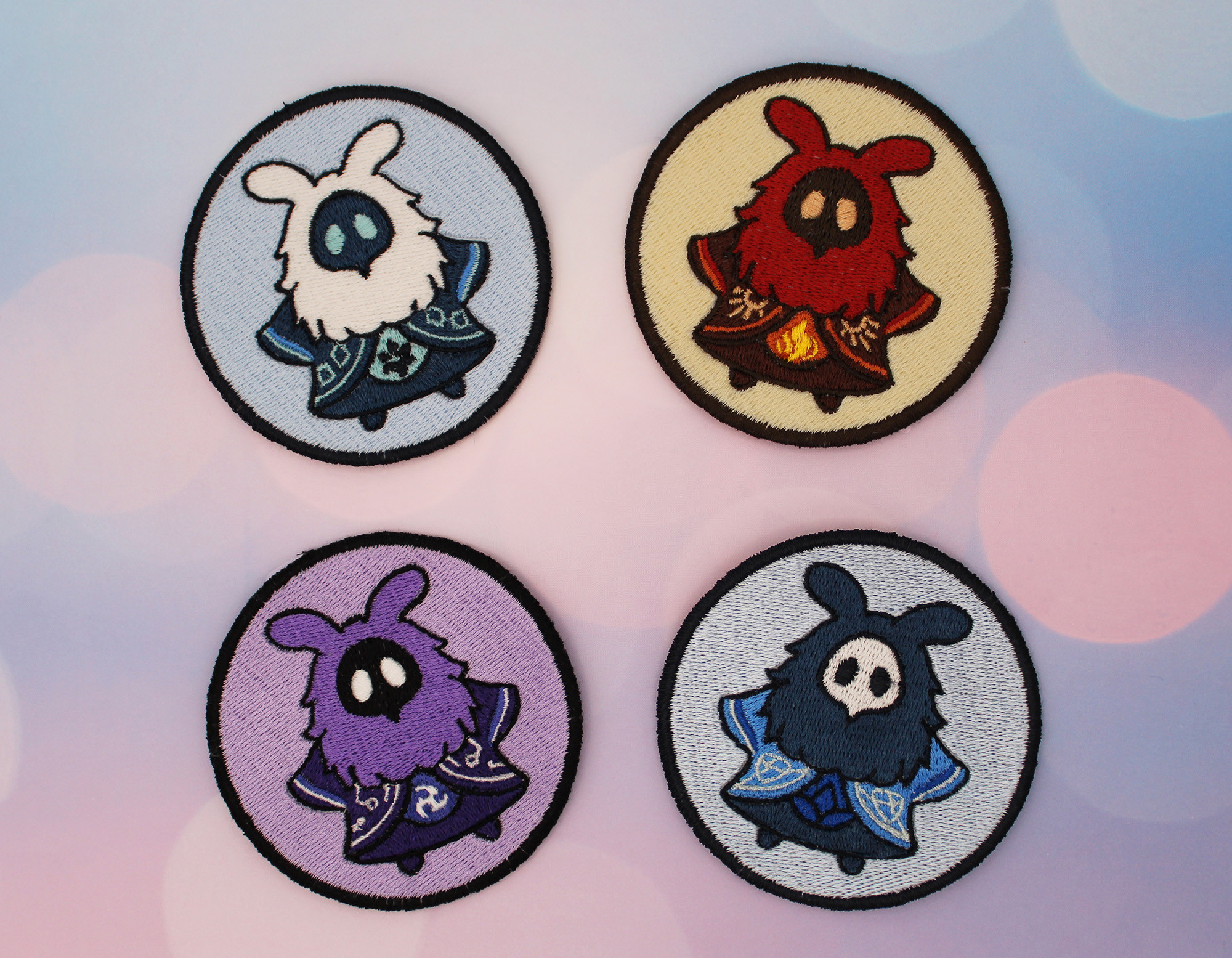 All four Abyss Mage patch designs together, each patch 3x3in.