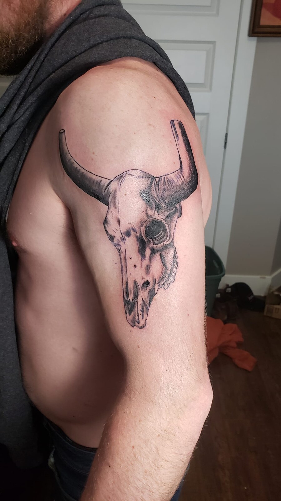 His first tattoo with me of the cow skull.