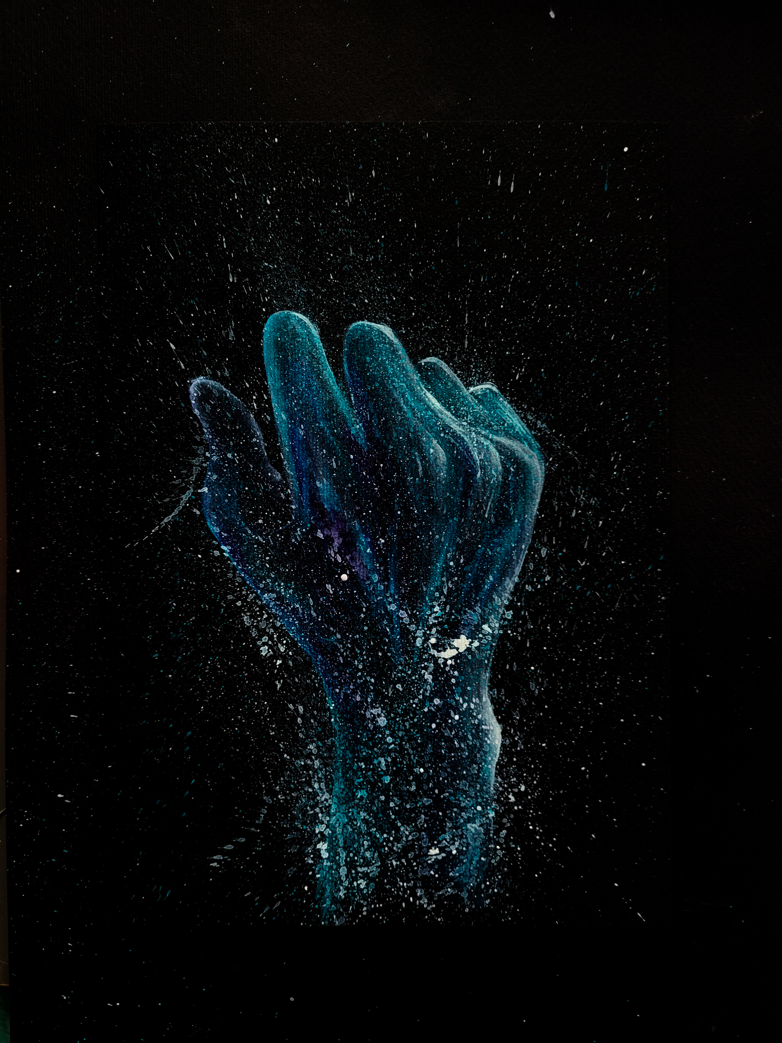 A sketch of the ghostly hand made for setting up colors and the general idea. Watercolor on black paper. 