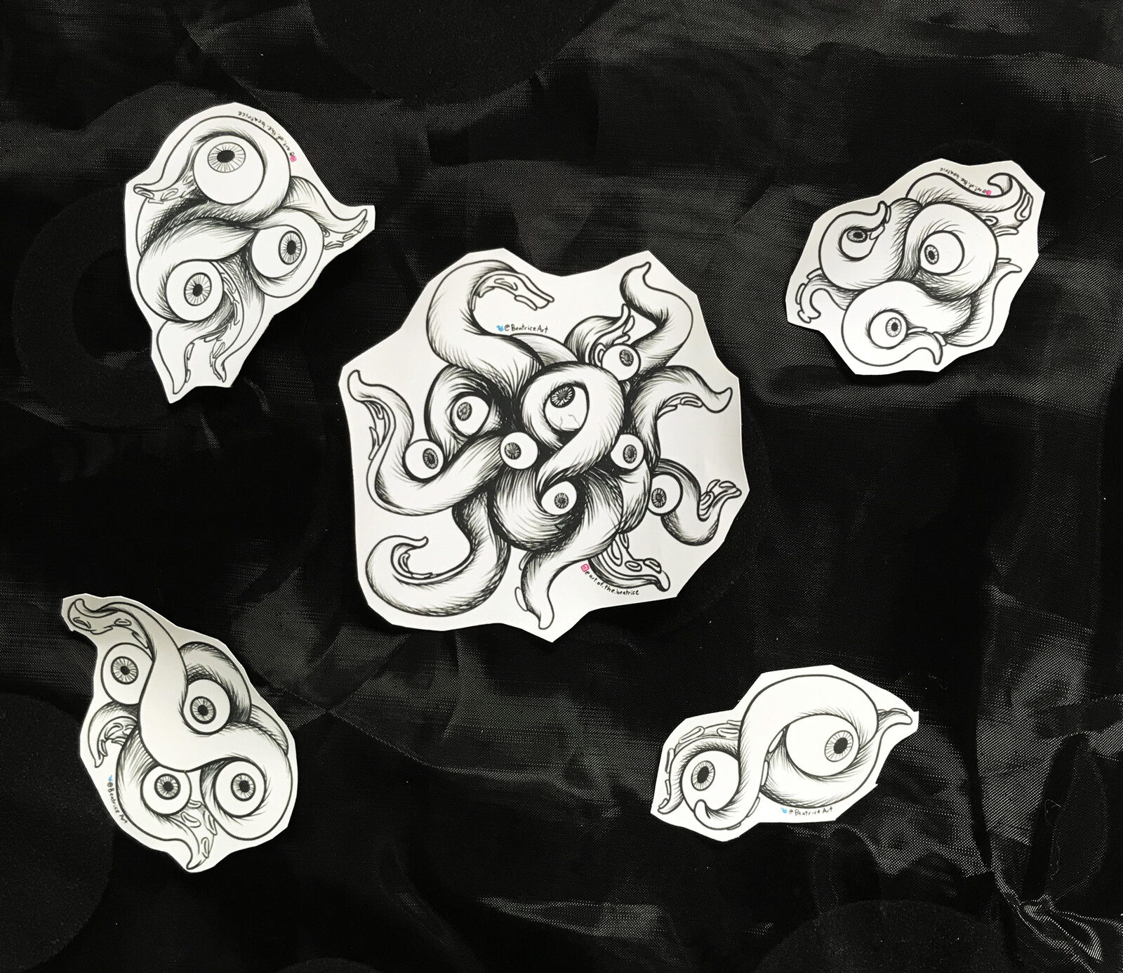 The full collection of Squidgie sticker designs.
