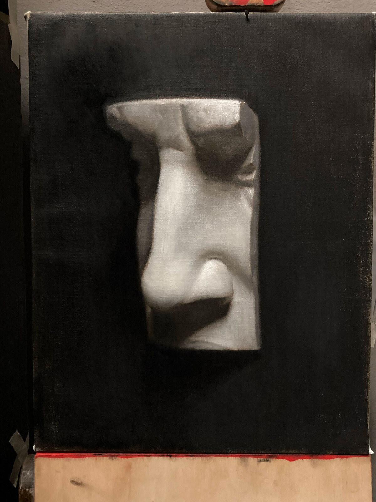 On the easel.