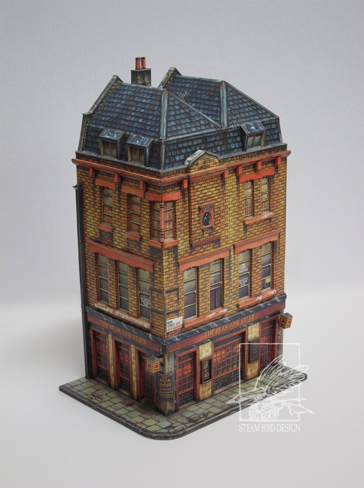 Cut and Assembly Model of "The Bear and Staff" pub in the London theater district. Published by Dover Publications 1992. 
Assembled view 1.