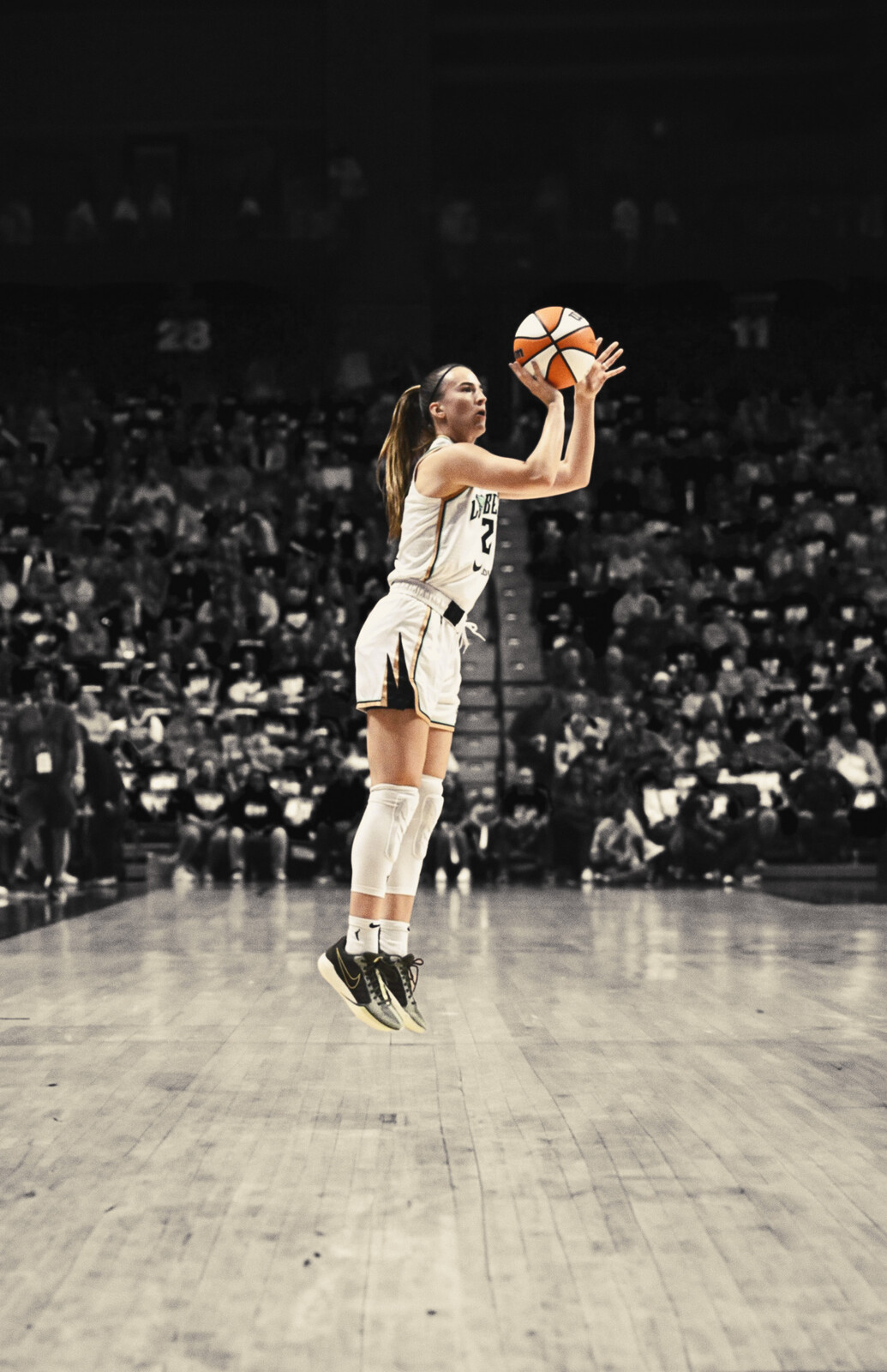 Sabrina Ionescu Shooting a 3-Pointer