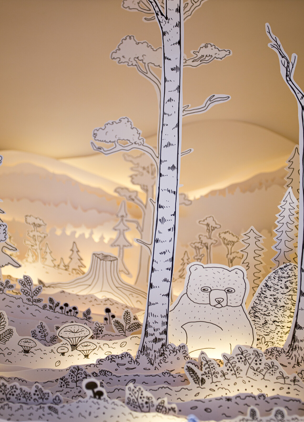 Paper diorama of arctic landscape.