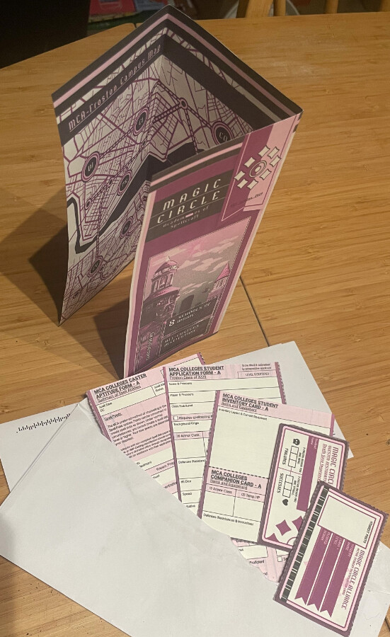 A setup picture of the final materials after printing. 
(Unfortunately my printer's yellow ink was not printing, so the end result became a little pink)