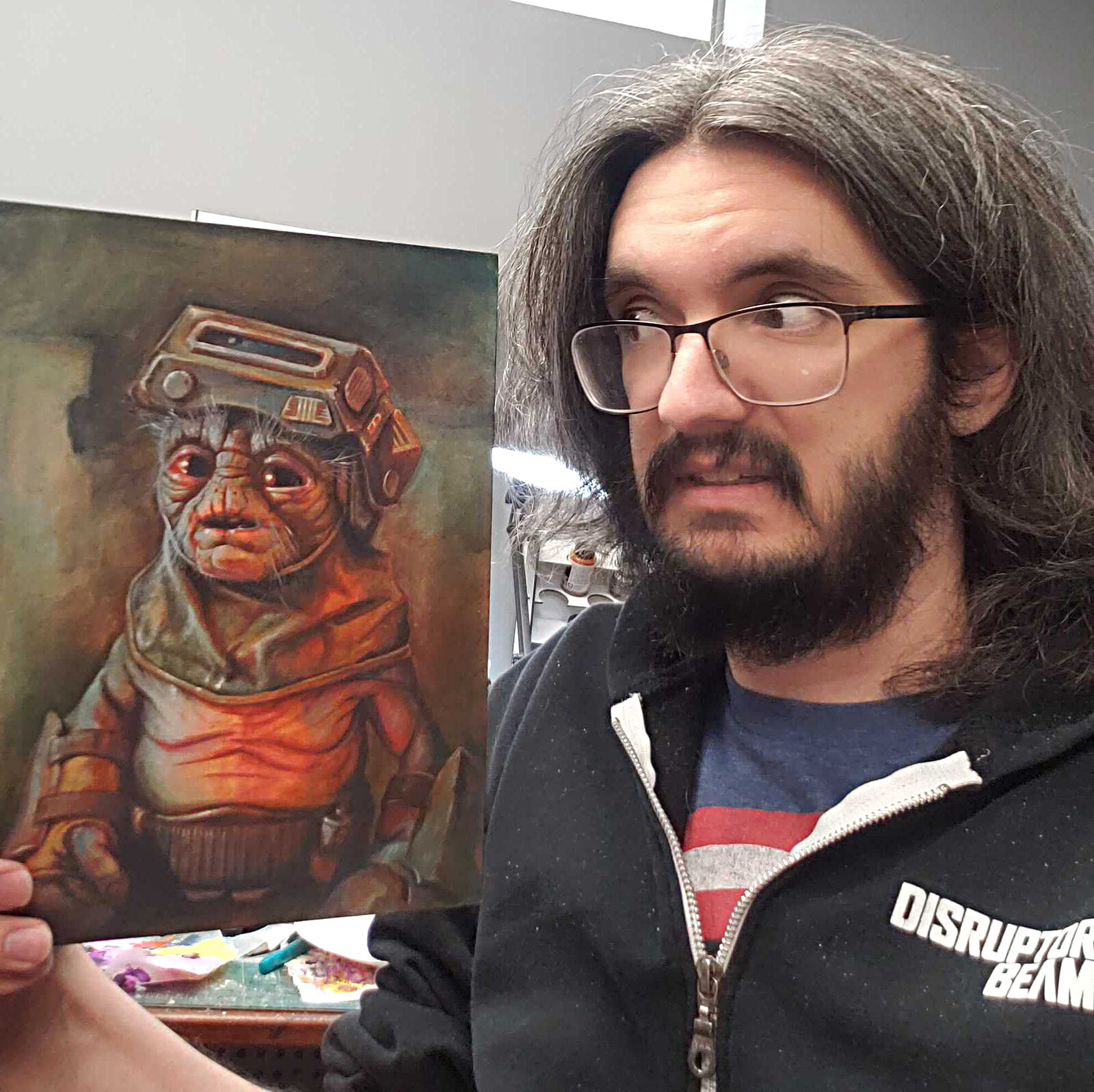 When you do a real thing you have to take a picture of yourself holding it for some reason.  So here we are making the same face at each other.