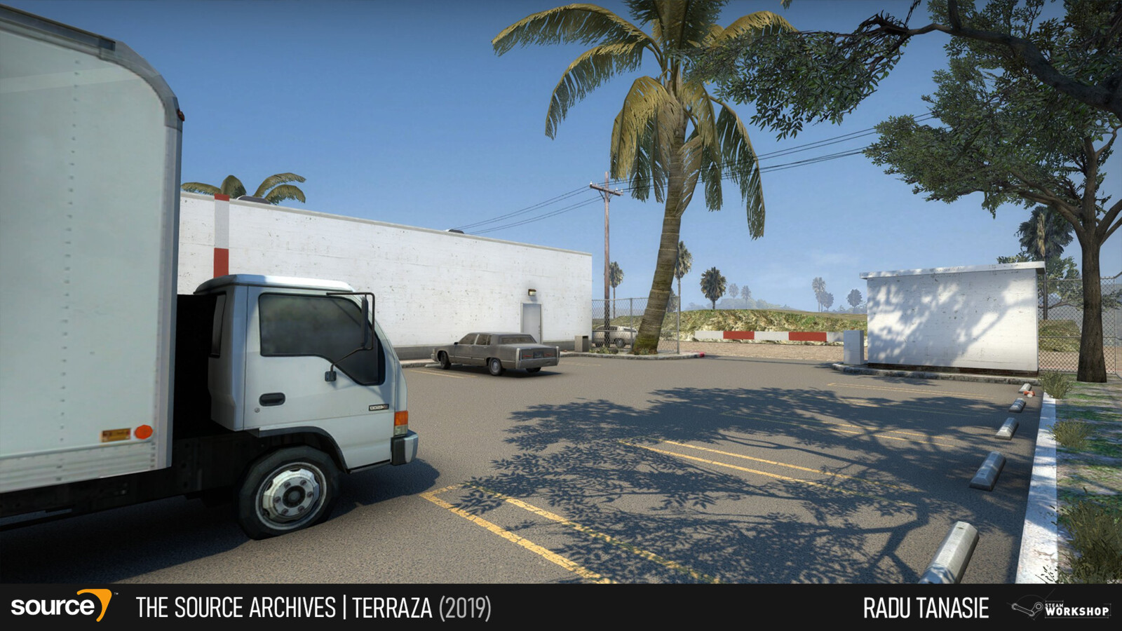 The attacking team spawns in a parking lot connecting to the side streets that lead to the main building.