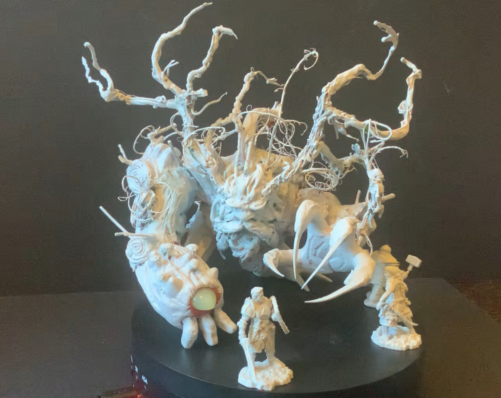 This was a mix of toybash, green stuff sculpt, and 28mm figure kitbash.