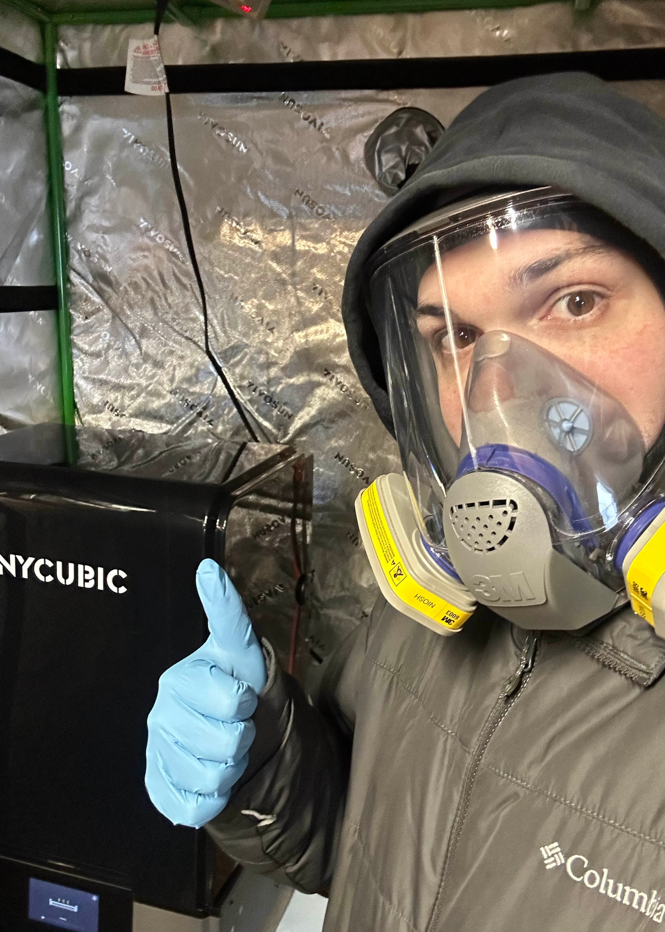 My printer (and me) in the tent. 

Note: always use proper PPE when working with chemicals, even MSLA resin. 