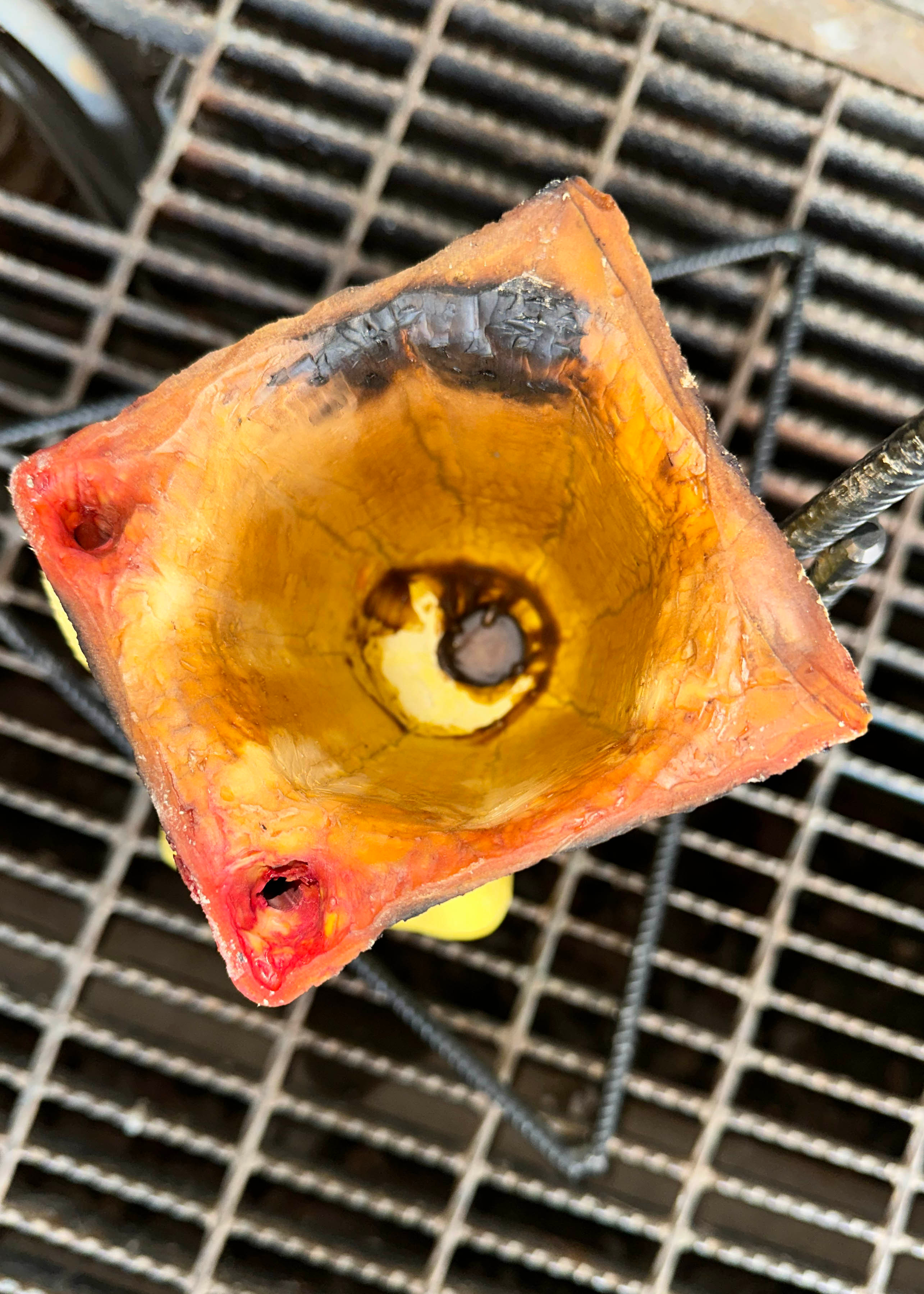 Pour cup wax already removed using a blowtorch.