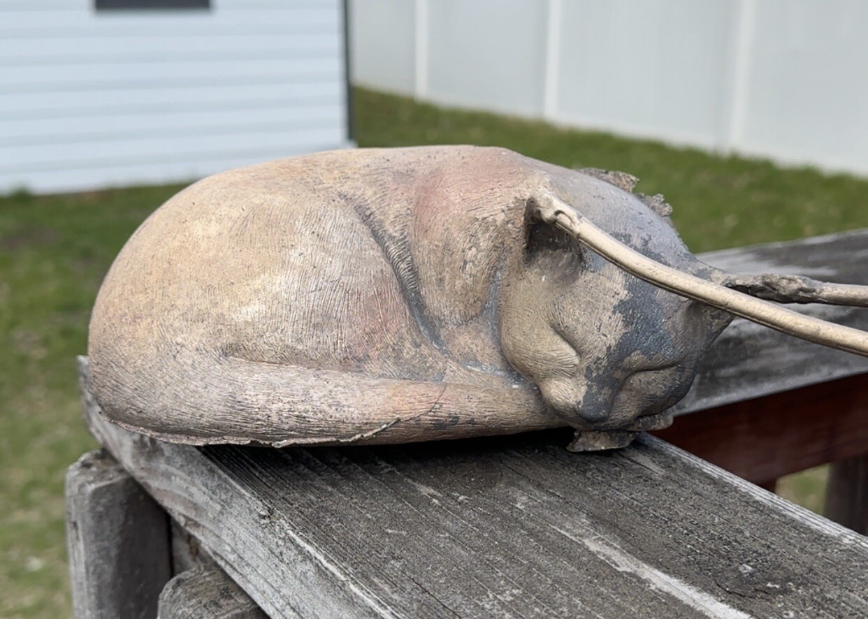 Cleaned up with a wire brush after using a small metal pick to remove the remaining shell fragments. The sprue and pour cup were cut off with a hacksaw. 