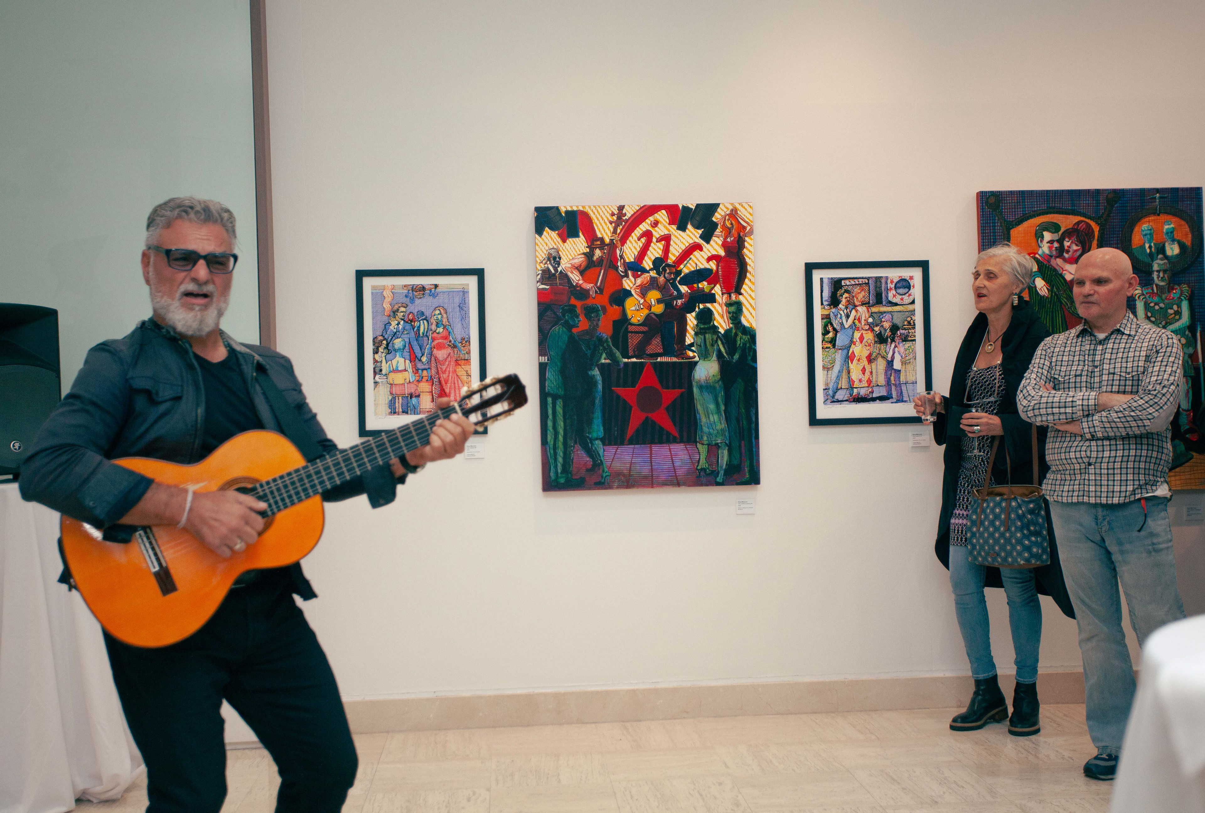 Musical Artist Dominic Mancuso performing to open the festivities. Photos by Obi Ogbonna