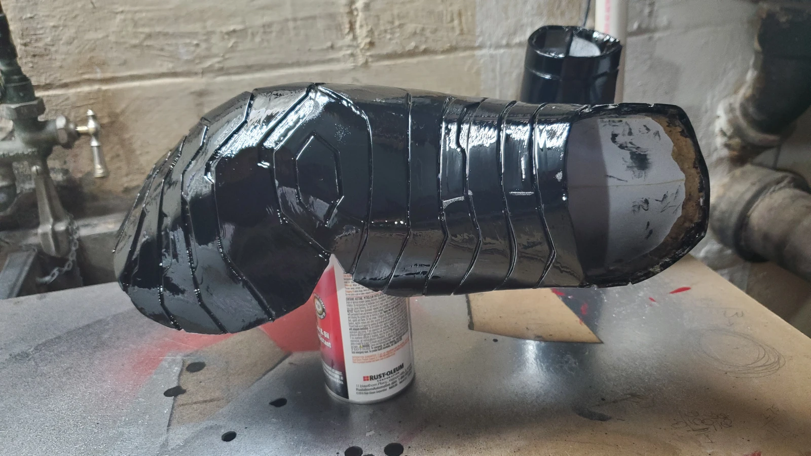 Sanding done after 5 layers of mod podge! Sprayed with two coats of a gloss black. 