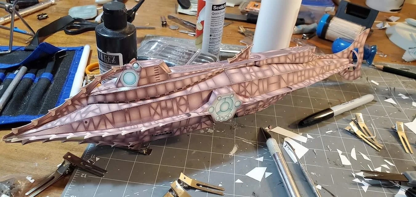 20,0000 Leagues Under the Sea - Nautilus Paper Card Model. Build by Dale Jackson. Designed by Kevin Kittle. Free Model at: https://www.disneyexperience.com/activities/models/20klus_model.php?