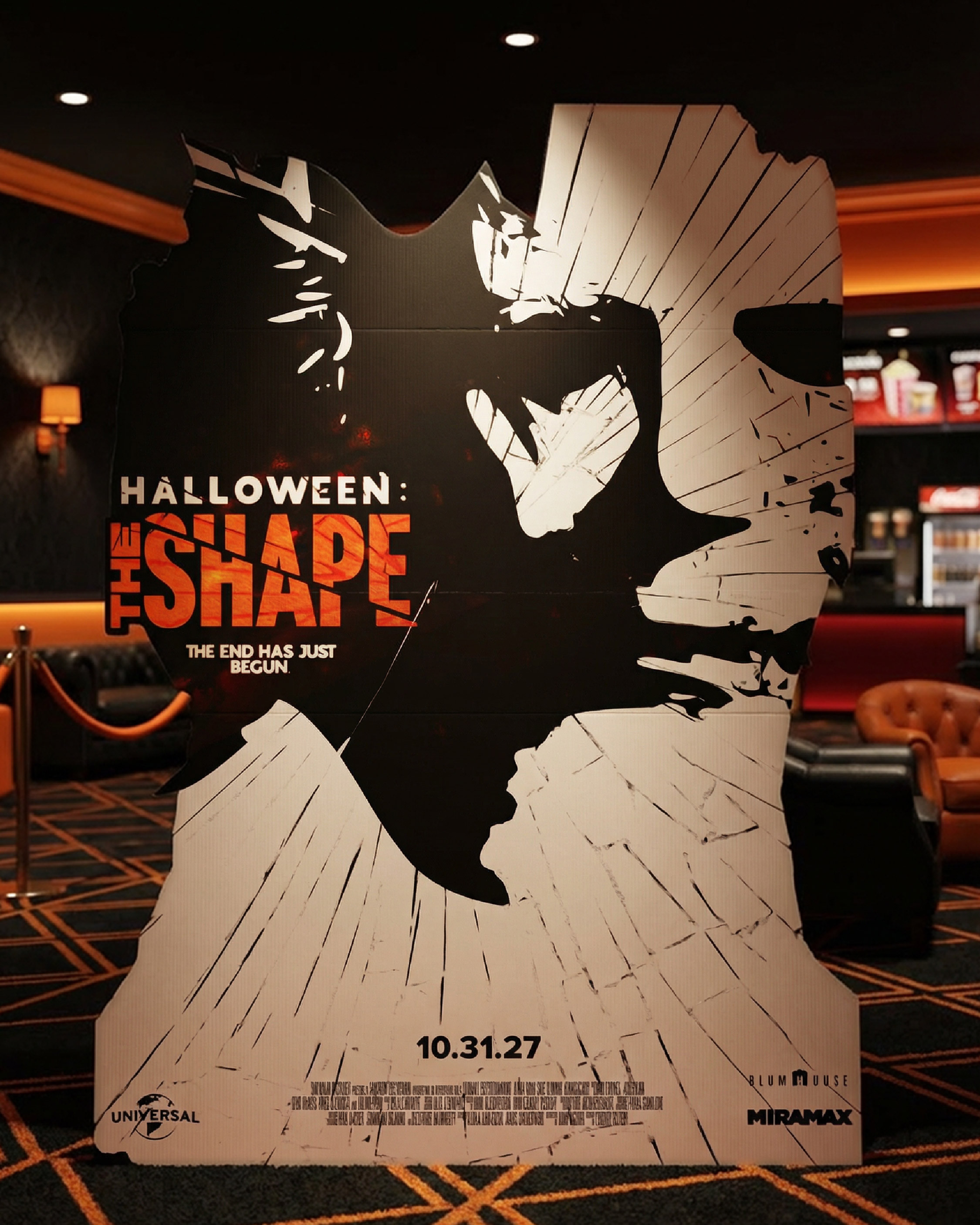 Die-cut lobby display extending the fractured silhouette into a physical installation piece