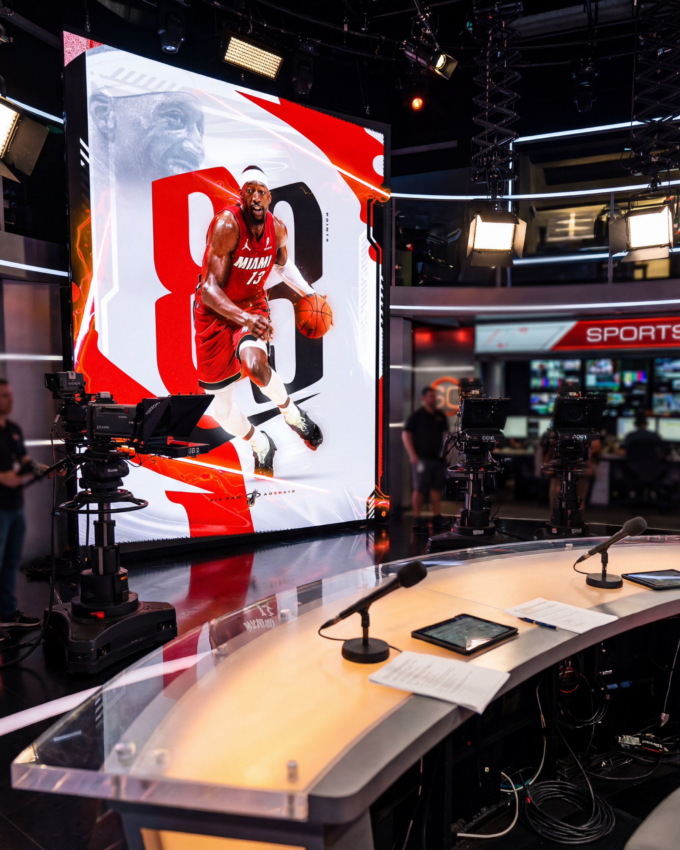 On the LED broadcast screen inside the ESPN SportsCenter studio. Cameras, anchor desk, live broadcast atmosphere. This is exactly the environment where the world found out what Bam did that night