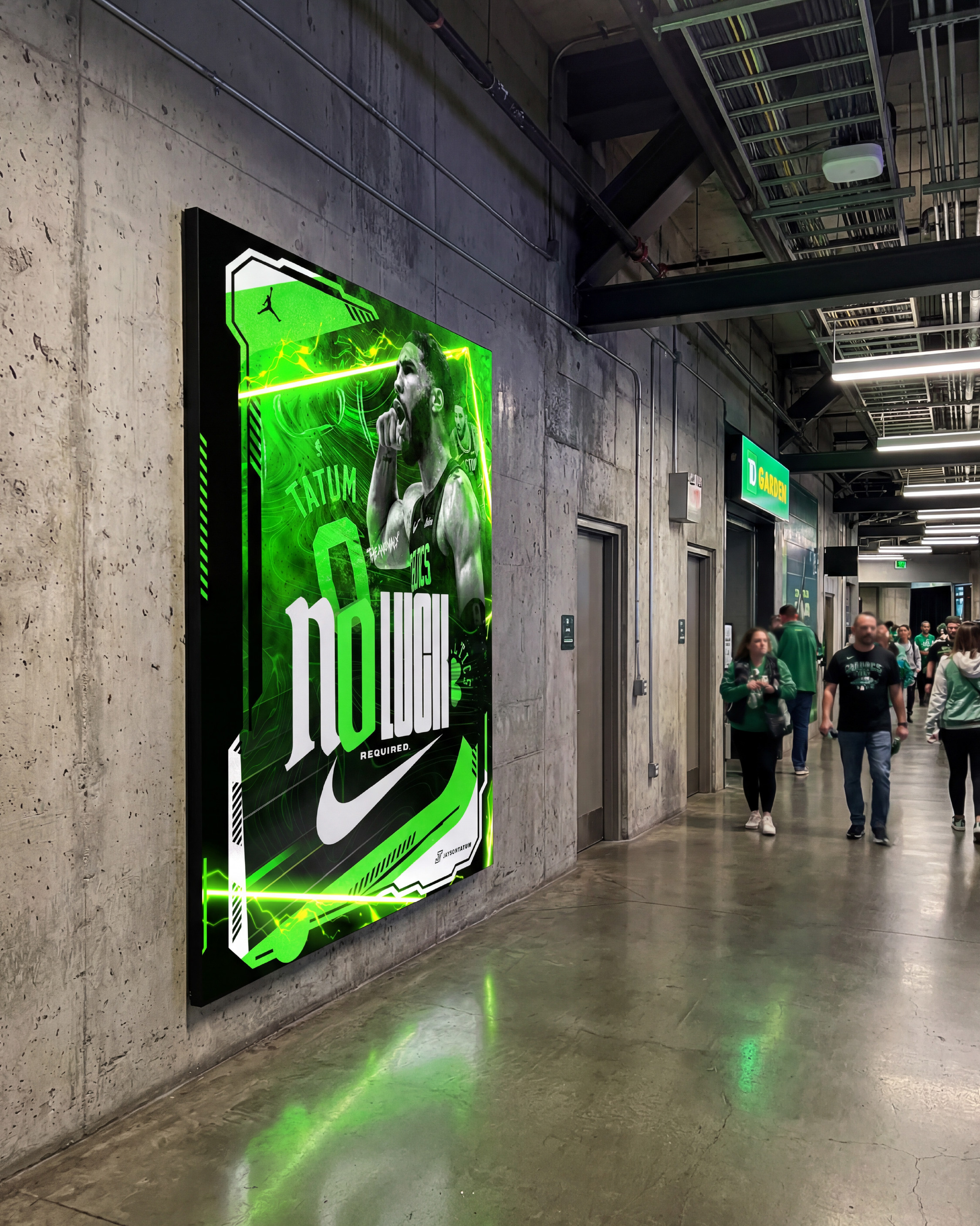 The same TD Garden corridor with Celtics fans walking past. Green reflecting off the floor from the poster's neon energy. This is what game night looks like when the creative is built to live inside the arena