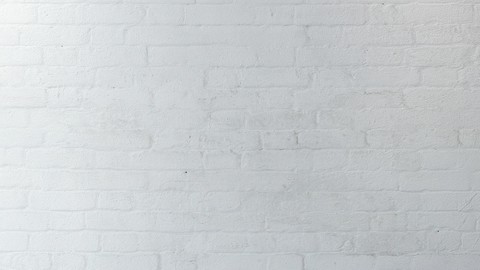 Aged brick walls of white brick